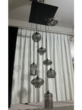 https://cdn.shopify.com/s/files/1/0554/8562/8591/files/LYFAIRSModernSmokeGrayGlassPendantLightFixtureChandelier_1.png?v=1766650593