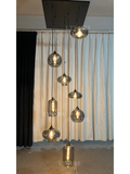 https://cdn.shopify.com/s/files/1/0554/8562/8591/files/LYFAIRSModernSmokeGrayGlassPendantLightFixtureChandelier_2.png?v=1766650593
