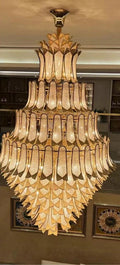 https://cdn.shopify.com/s/files/1/0736/8795/7790/files/extra-large-luxury-multi-tier-gold-crystalchandelier-for-stairslarge-high-ceiling-room-merlin-lamps-9.jpg?v=1765406246