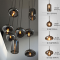 https://cdn.shopify.com/s/files/1/0554/8562/8591/files/lyfairs_ModernSmokeGrayGlassPendantLightFixtureChandelier.png?v=1766650593